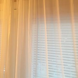 Wamsutta white sheer curtain panels from Bed Bath & Beyond. 84” L x 60” W